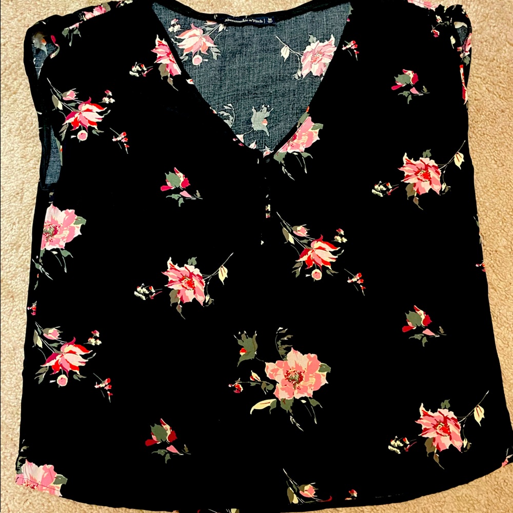 A&F black and pink flower top. V neck. Button detail.